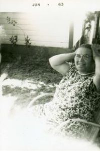 One of the only pictures of my Grandma. Taken at "The Farm".  She made all her own dresses and aprons.